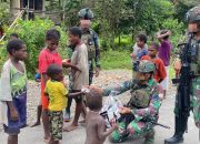Anak-Anak Muara Sambut Gembira Komsos Marinir Habema
