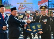 Bupati Takalar Hadiri HUT Bhayangkara ke-80, Serahkan Hibah Empat Bidang Tanah untuk Polres Takalar Menulis