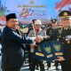 Bupati Takalar Hadiri HUT Bhayangkara ke-80, Serahkan Hibah Empat Bidang Tanah untuk Polres Takalar Menulis